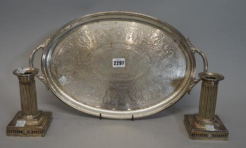 A Victorian twin handled oval silver tray, Barnard & Sons, London, 1873, engraved with scrolling foliage and with geometric pattern border, 44cms wide