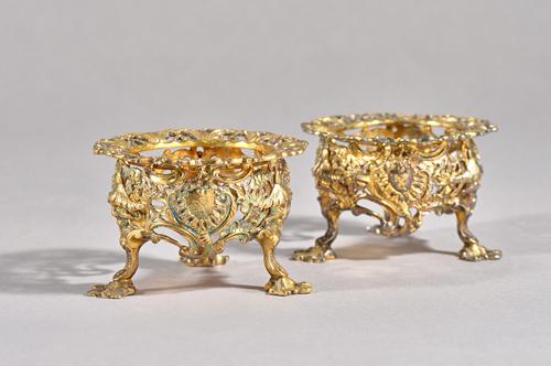 An unusual near pair of Victorian silver gilt salt stands in the Chinese Chippendale manner, London 1845/1846, maker's mark JF(E)(?) and E*, lacking l