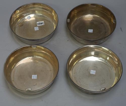 Boin-Taburet, Paris; a set of four French silver circular vegetable bowls, marked to underside and with Minerva hallmark, 20.5cms diam, 1975g. (4)
