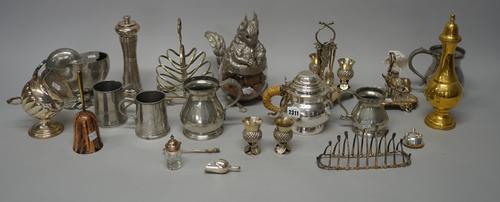 Assorted silver plate including; a 19th century jug; an egg cup stand with four thistle shaped cups and similar spoons;  a cruet stand with central do