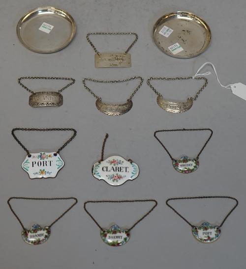 A pair of George IV silver decanter labels, one detailed Whisky and the other detailed Port, by George Knight, London 1822, a pair of silver dishes an