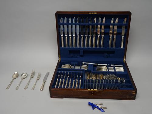 An extensive collection of silver Chester pattern table flatware, comprising; fourteen silver handled table knives, with steel blades, sixteen table f