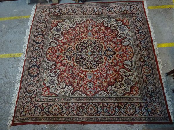 A Persian carpet, 232cm x 238cm.