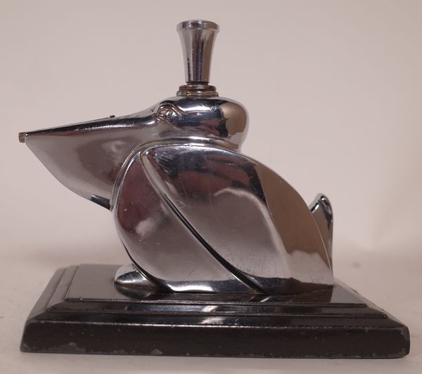 Rowson; a 20th century silver and plated table lighter in the form of a pelican, 7cm high.