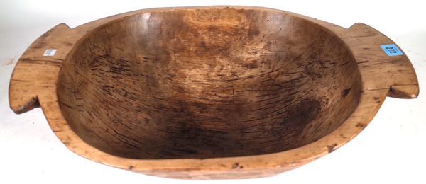 A large 20th century softwood bowl, 58cm wide x 16cm high.