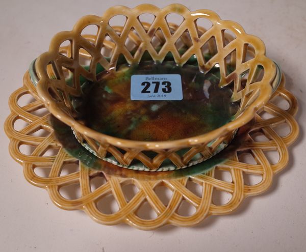 A 19th century Wedgwood majolica ceramic basket with matching stand, 17cm wide.