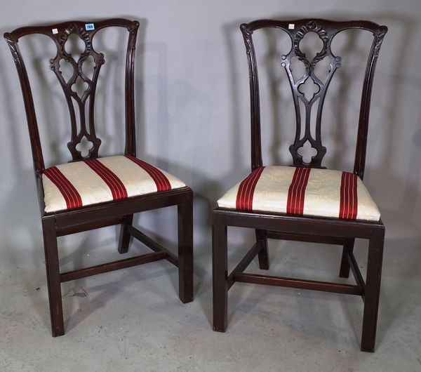 A pair of mid-18th century style mahogany dining chairs with pierced splat on square supports, 51cm wide x 98cm high.