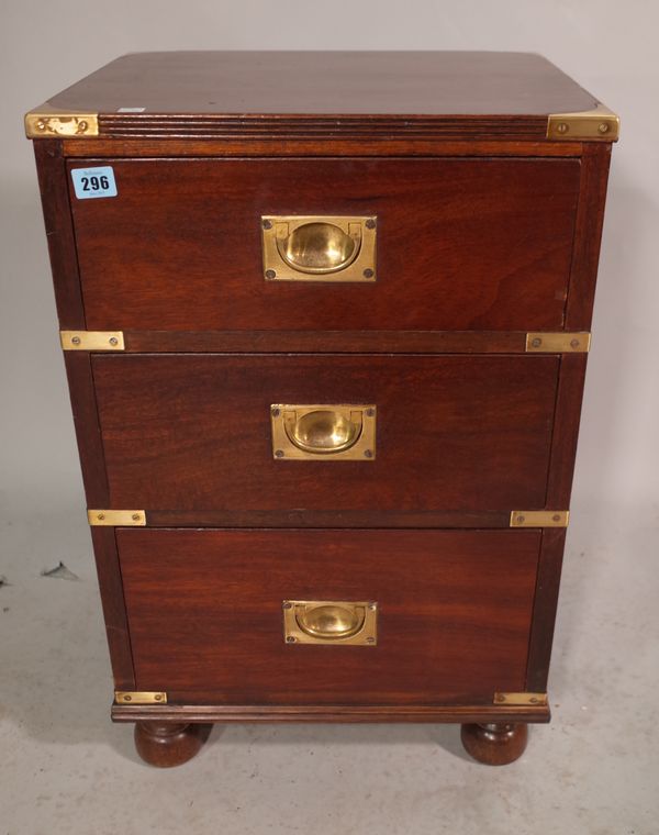 A pair of campaign style brass bound mahogany three drawer pedestals on bun feet, 43cm wide x 66cm high.