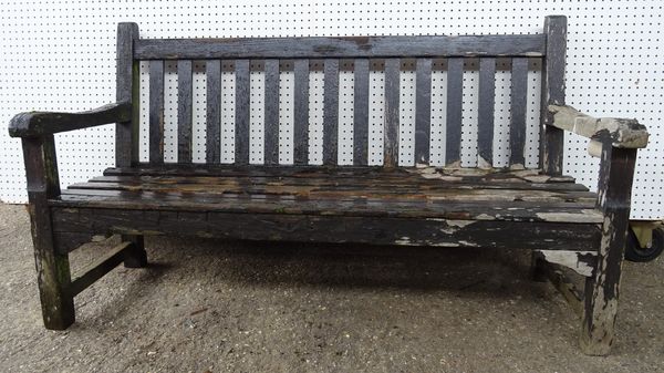 A 20th century brown painted hardwood garden bench, 150cm wide.