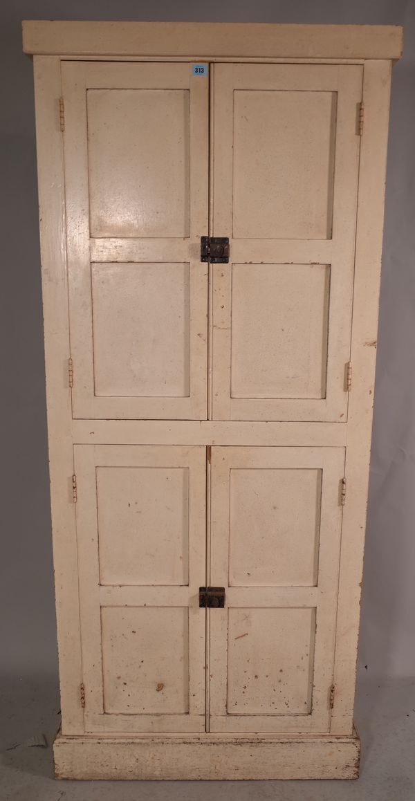 A 20th century cream painted side cabinet with panelled doors, 80cm wide x 182cm high.