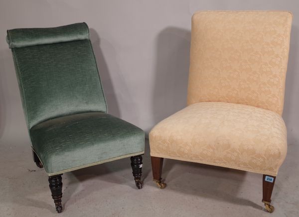 An early 20th century mahogany framed low chair and another similar, (2).