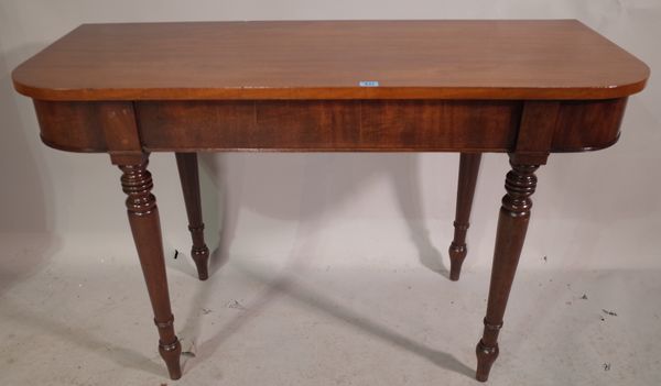 A Victorian mahogany console table on ring turned tapering supports, 120cm wide x 73cm high.