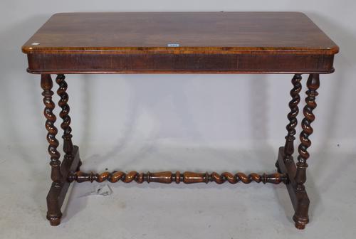 A 19th century rosewood centre table raised on barley-twist columns and 'H' frame stretcher, 95cm wide x 66cm high.