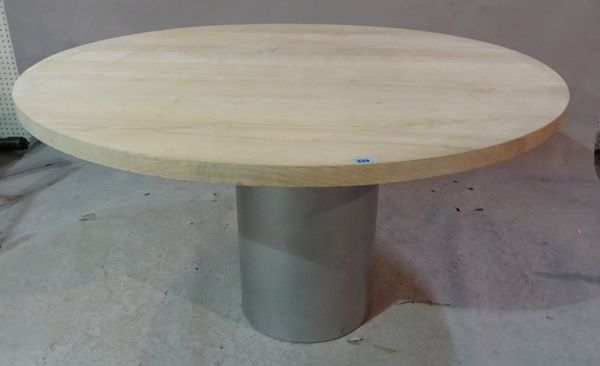 A 20th century oak dining table, the circular top on metal base, 139cm diameter x 73cm high.