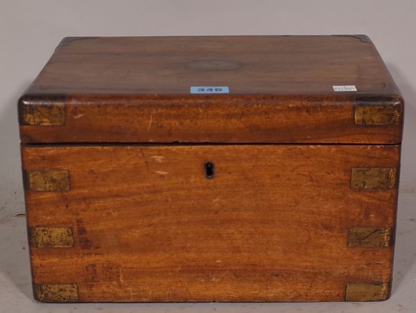 A 19th century walnut and brass bound lift top box, 30cm wide x 19cm high.