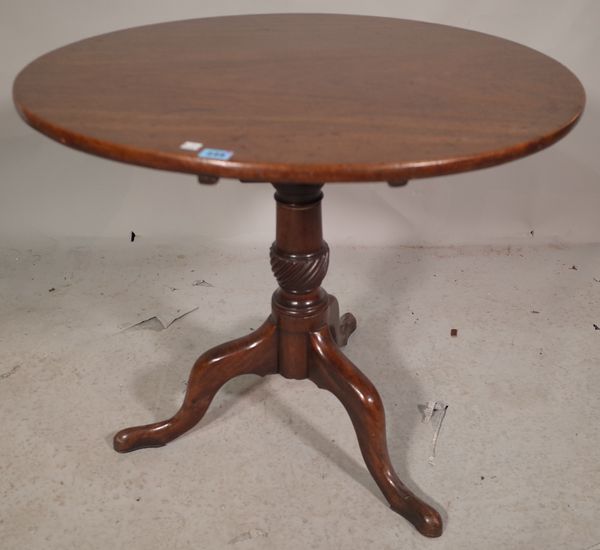 A George III mahogany tripod table, the birdcage mount over three downswept supports, 78cm wide x 70cm high.