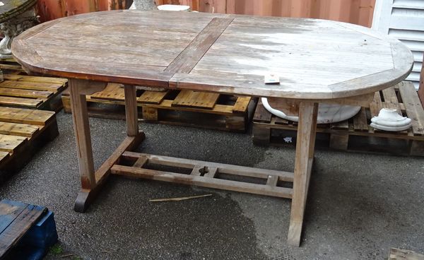 A teak rectangular extending garden table of slatted construction, 100cm wide x 180cm