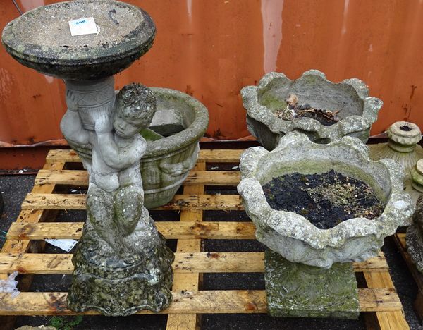 A pair of reconstituted stone jardinieres with leaf moulded body, 48cm diameter, a figured bird bath and a circular planter, (4).