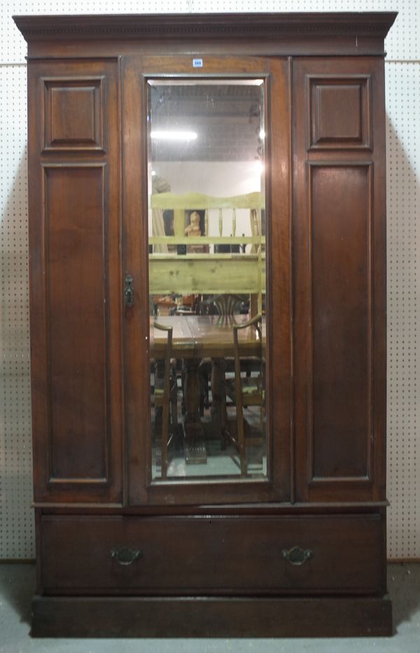 A Regency style mahogany single mirrored door wardrobe, 130cm wide x 190cm high.