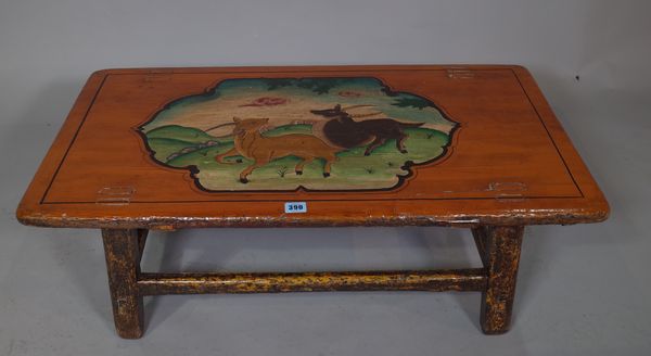 A 20th century Chinese hardwood low table, decorated with deer, 88cm wide x 29cm high.