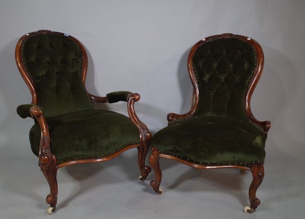 A Victorian mahogany gentleman's open armchair, 70cm wide x 94cm high, together with a matching lady's chair, 60cm wide x 89cm high, (2).