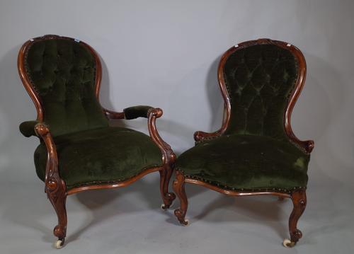 A Victorian mahogany gentleman's open armchair, 70cm wide x 94cm high, together with a matching lady's chair, 60cm wide x 89cm high, (2).