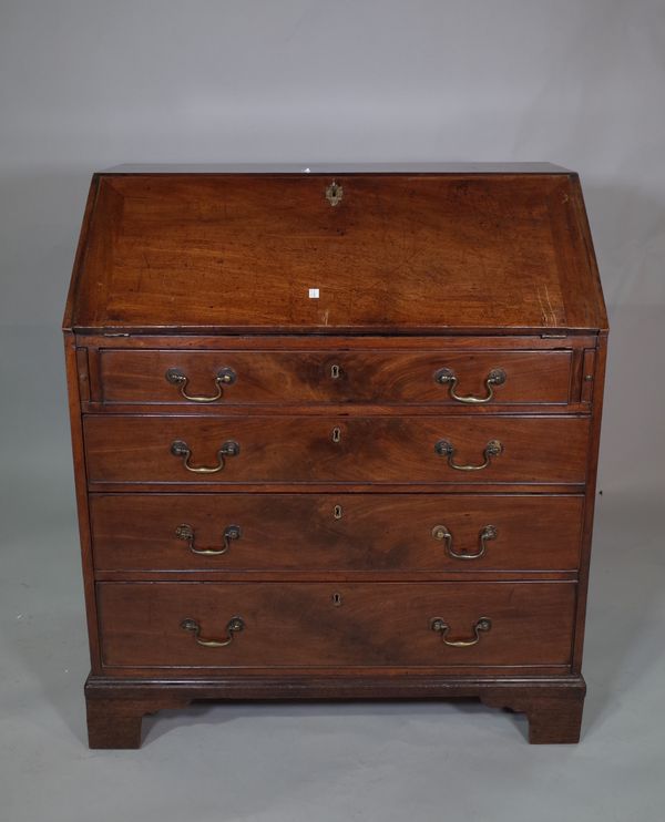 A George III mahogany bureau with four long graduated drawers, 91cm wide x 105cm high.