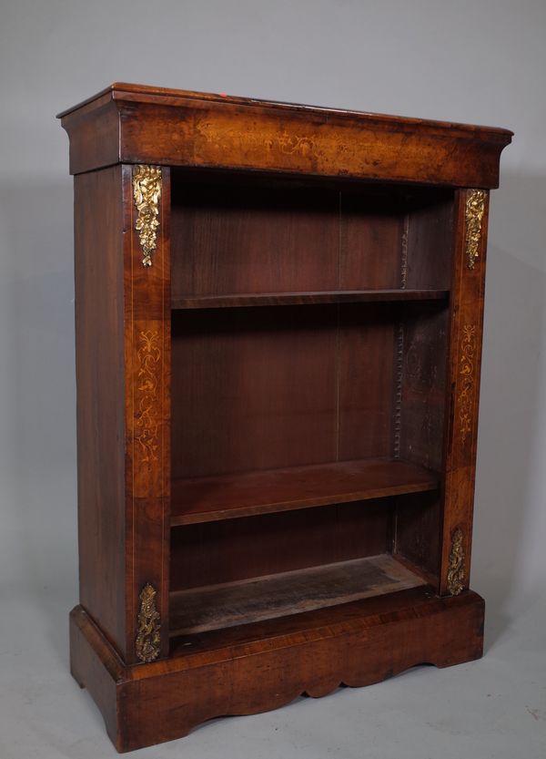 A Victorian walnut and ormolu mounted open bookcase on plinth base, 77cm wide x 105cm high.