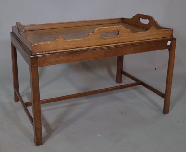 A George III mahogany butlers tray on stand, 70cm wide x 50cm high.