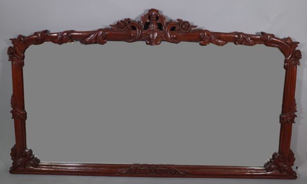 A Victorian style mahogany overmantel mirror, with carved floral and vine decoration, 155cm wide x 88cm high.