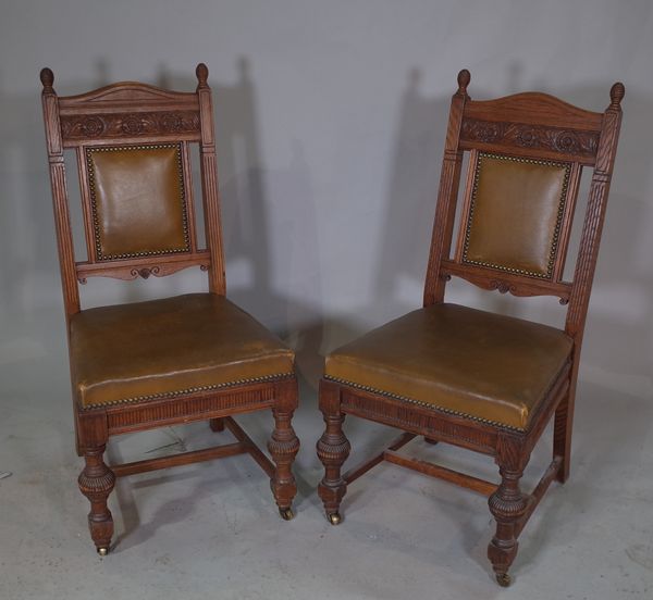 A set of six 20th century oak dining chairs, green studded leather upholstery on turned supports, (6).