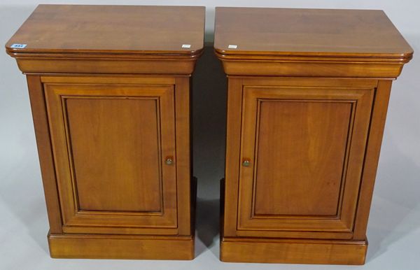 Harrods a pair of 20th century walnut single door bedside cupboards, 45cm wide, (2).