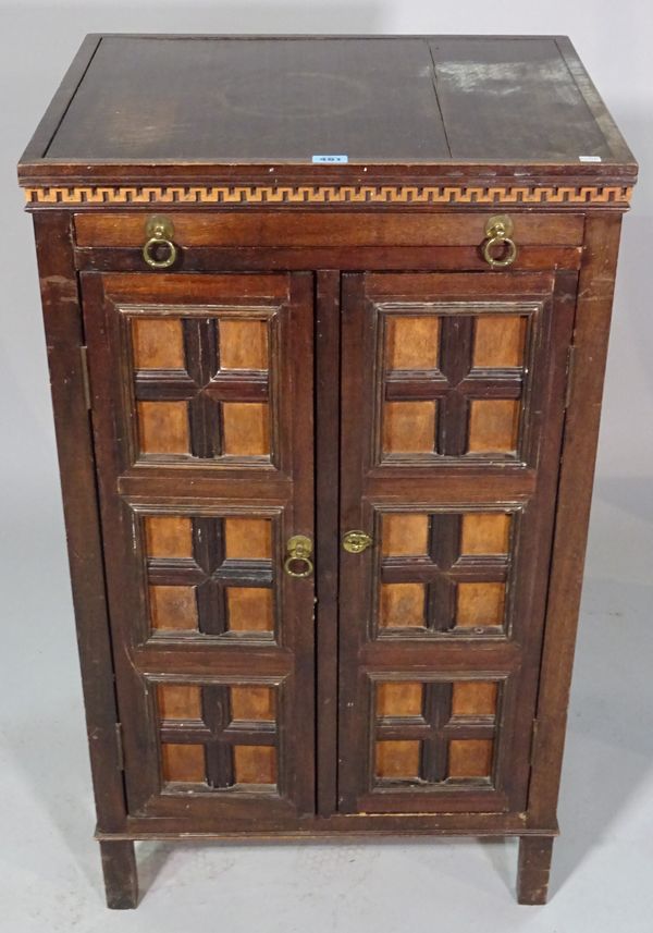 A 20th century hardwood side cabinet with Greek key border decoration, 55cm wide x 95cm high.