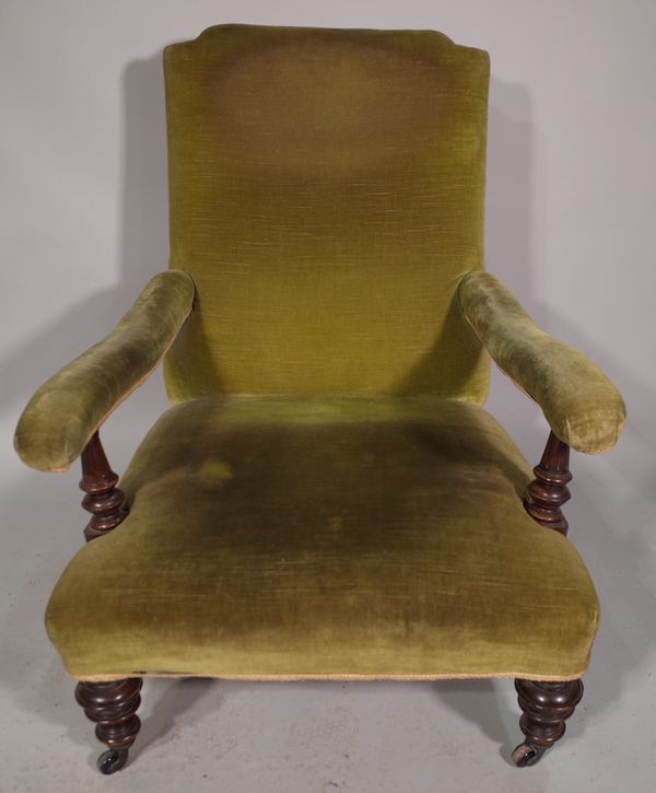 A Victorian mahogany framed low open armchair with green upholstery and a similar Victorian low armchair, (2).