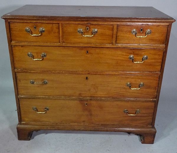 A George III mahogany chest of three short and three long drawers on bracket feet, 112cm wide x 104cm high.