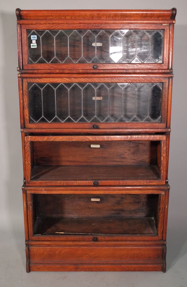 The Globe Wernicke Co Ltd, an oak four tier bookcase, 87cm wide x 156cm high.