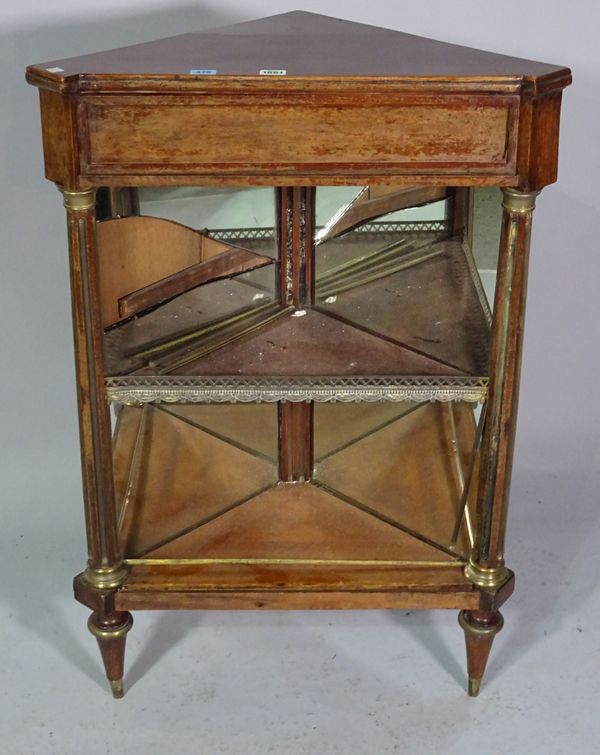 A 19th century French gilt metal mounted mahogany corner cabinet with fluted supports, 66cm wide x 99cm high.