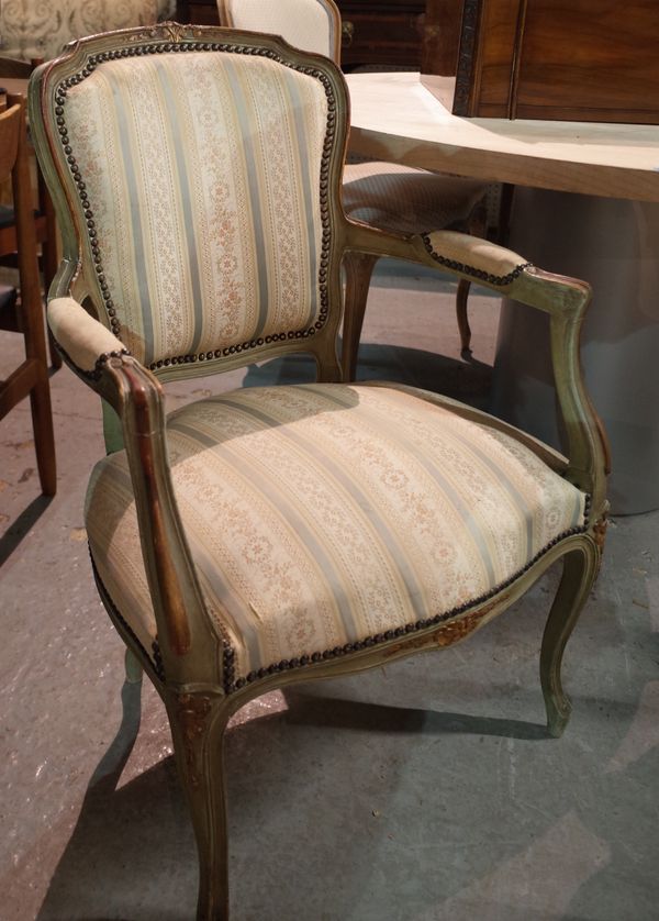 A Louis XV style open armchair with green painted frame on cabriole supports, 60cm wide x 88cm high.