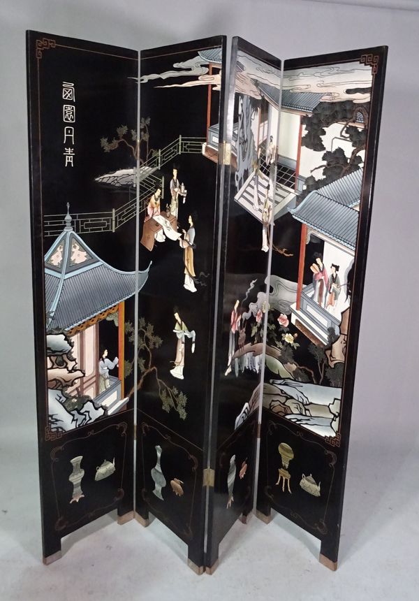 A 20th century Eastern black lacquer four fold screen decorated with Geishas in an interior, 164cm wide x 183cm high.