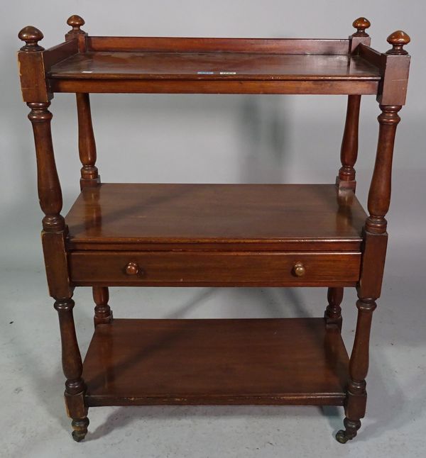 A small Victorian mahogany three tier buffet with single long drawer on baluster turned supports, 75cm wide x 105cm high.