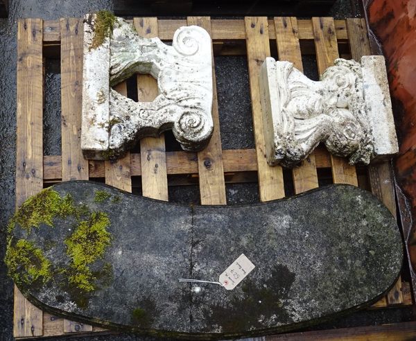 An early 20th century reconstituted stone curved garden bench on associated pedestal base, 117cm wide x 44cm high.