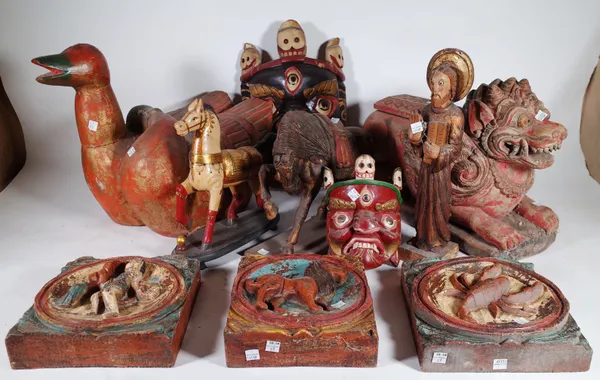 A quantity of mostly 20th century hardwood carved eastern collectable items, (qty.).