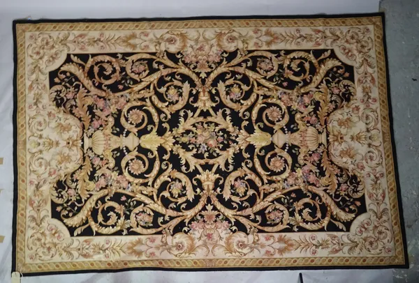 An Aubusson style tapestry carpet, 266cm x 175cm.