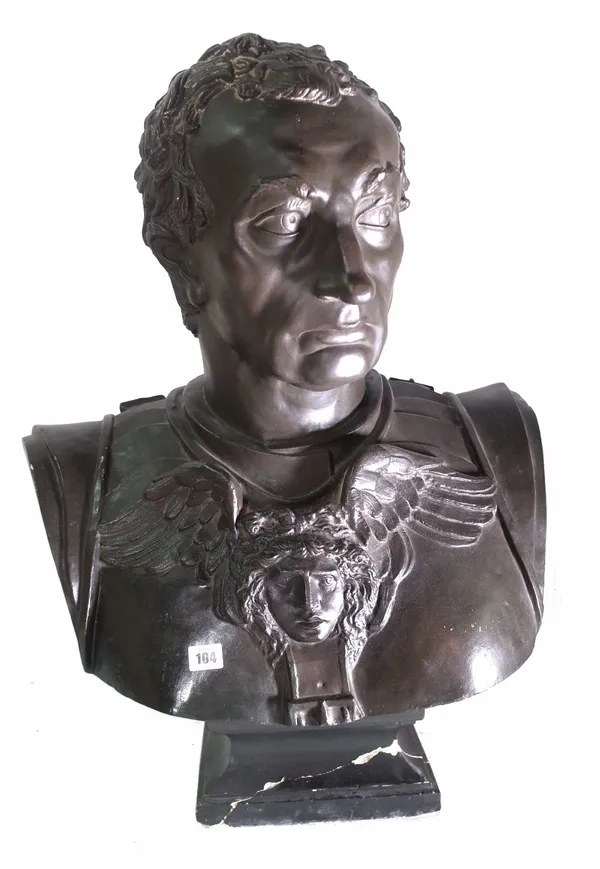 After the Antique; a modern black painted plaster bust of a Roman Emperor, 78cm high. Provenance; property from the late Sir David TangThis lot has be