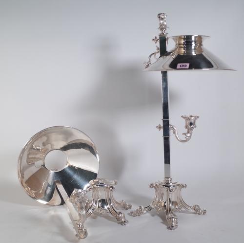 A pair of Continental silver plated candle lamps with adjustable shades and acanthus moulded base, approximately 67cm high. (2)  Provenance; property