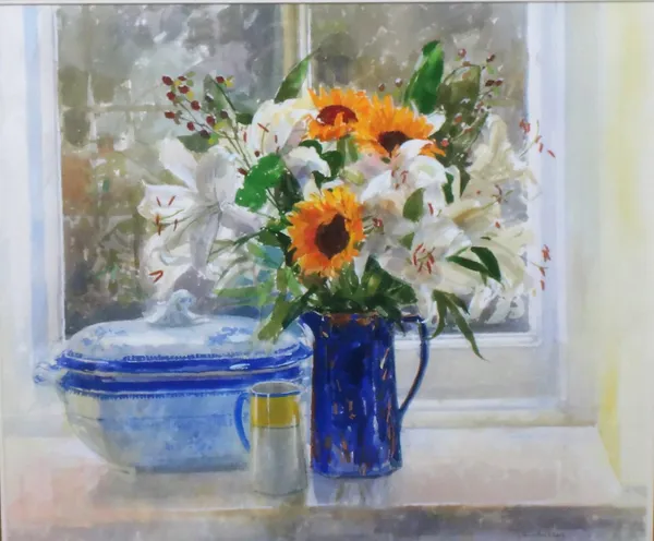 Pamela Kay (b.1939), Sunflowers and lilies in a blue jug, watercolour, signed, 46.5cm x 65cm. DDS