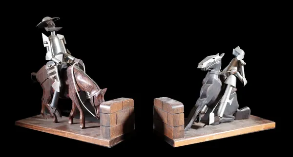 A pair of hardwood and steel bookends modelled as figures on horseback, 33cm wide. (2)  Provenance; property from the late Sir David TangThis lot has