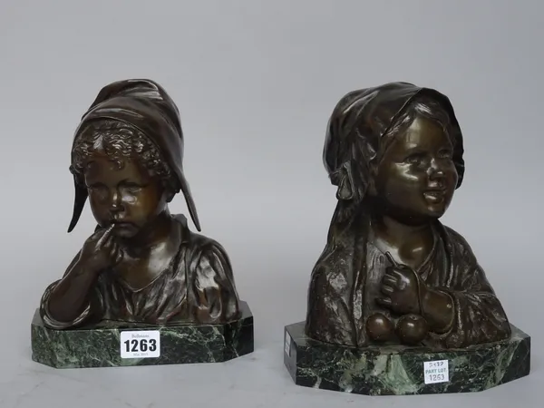 After Joseph D'Aste (Italian 1881-1945) two bronze busts 'Little Dutch Girl' and another depicting a young girl holding cherries, each signed to the c