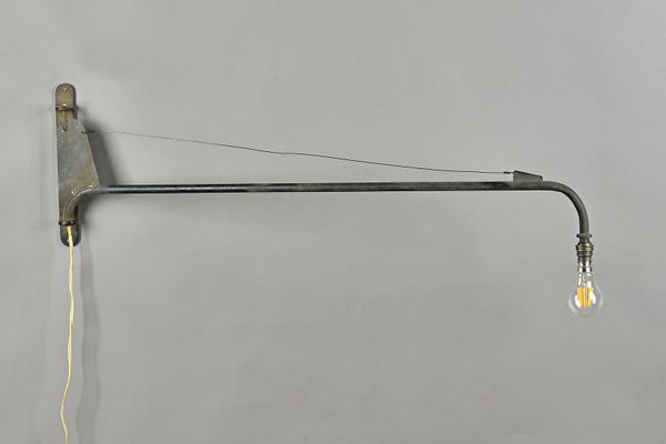 Jean Prouve, a swing-jib wall light, circa 1950, painted metal, 100cm.