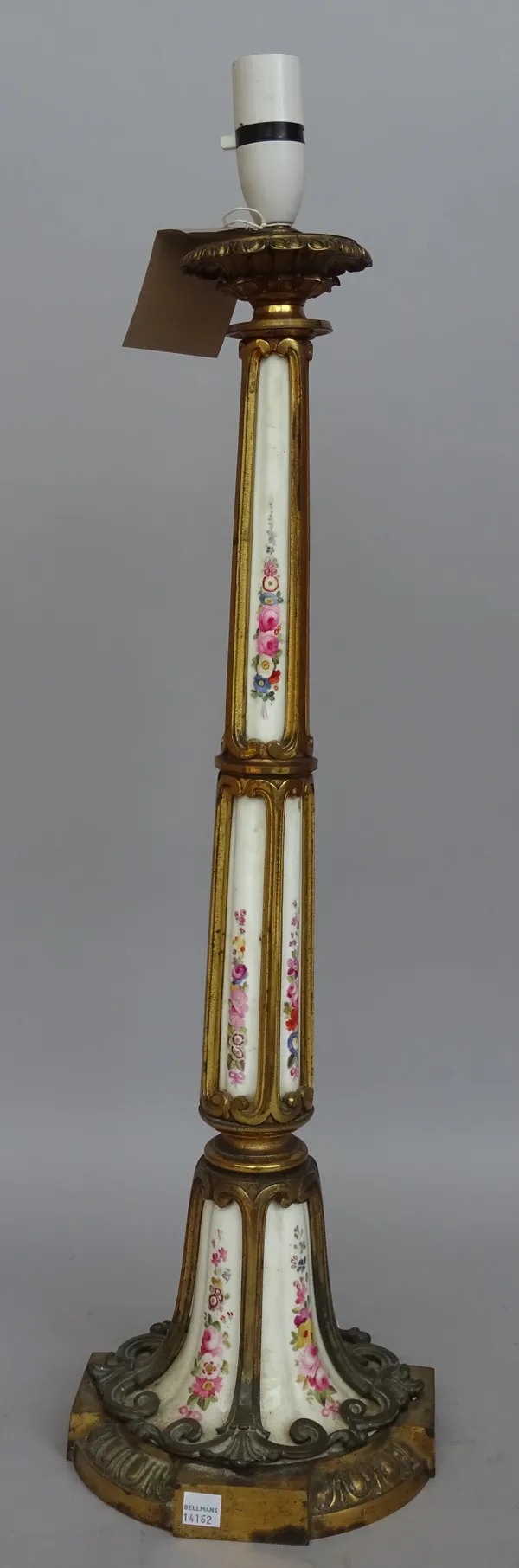 A French pottery and gilt metal mounted table lamp, late 19th century, (converted) on a circular base with foliate decoration to the pottery, 62cm hig